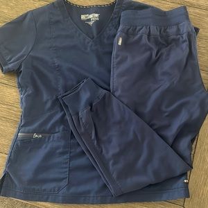 Navy blue scrubs, short sleeve top and jogger pants size large